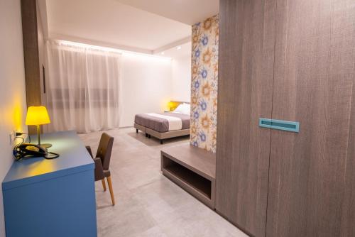 Χώρος καθιστικού στο Korè Hotel