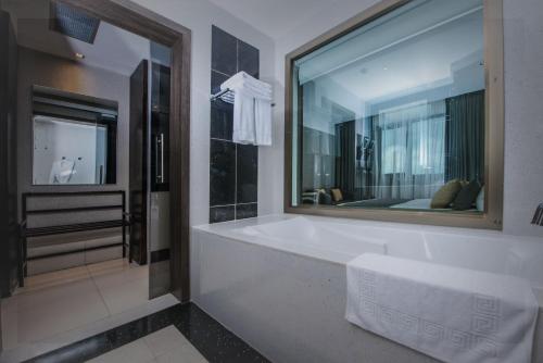 Cama o camas de una habitación en Krystal Palace Douala