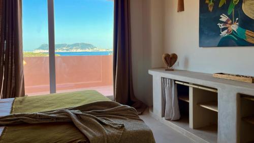 Posteľ alebo postele v izbe v ubytovaní Casa Chillout