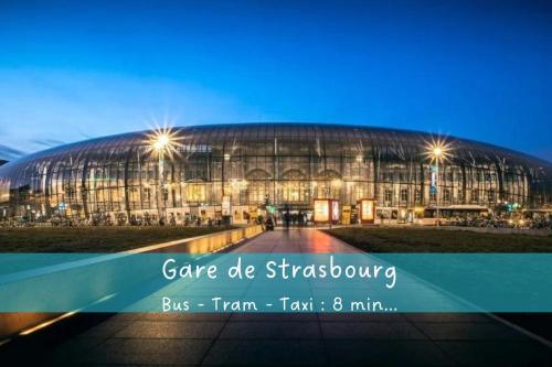 a large stadium with a building in front of it at VIEUX SCHILIK / Parking / Tram / Parlement / Proche Strasbourg Centre in Schiltigheim