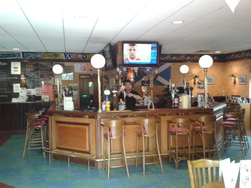 Lounge atau bar di The Weigh Inn Hotel & Lodges