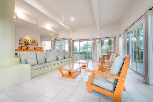 a living room with a couch and a table at 1053 - Villa Anka in Tangolunda