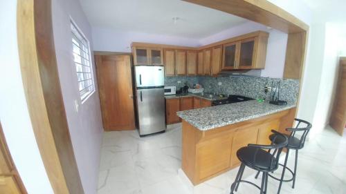 Kuchyň nebo kuchyňský kout v ubytování Apartamento amueblado, Res Blue Amber N3