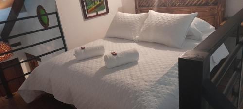 Ένα ή περισσότερα κρεβάτια σε δωμάτιο στο Hotel la Casita de Toñito