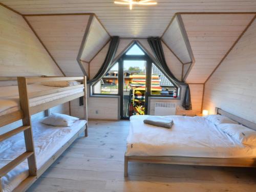 Ένα ή περισσότερα κρεβάτια σε δωμάτιο στο Comfortable holiday homes with air conditioning