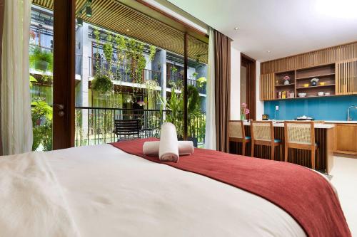Ένα ή περισσότερα κρεβάτια σε δωμάτιο στο Tam House Villa Hotel