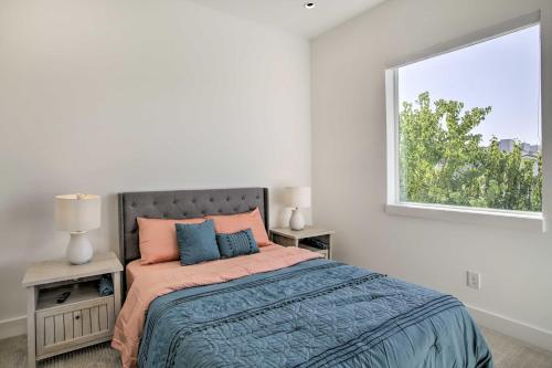 a bedroom with a large bed and a window at Newly-Built Luxury Galleria Area Townhome! in Houston