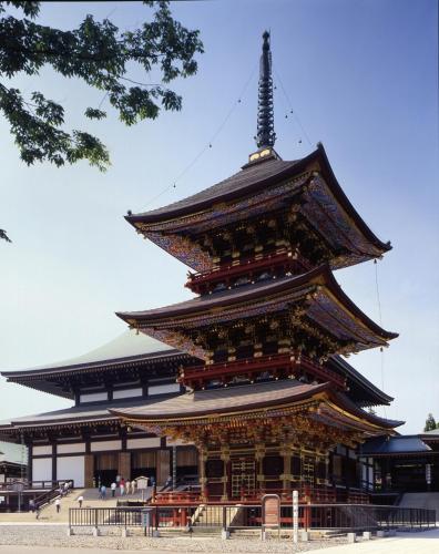 a large building with a pagoda in front of it at Narita U-City Hotel in Narita