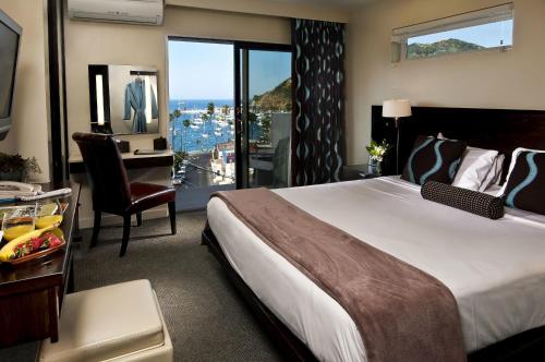 Giường trong phòng chung tại Aurora Hotel