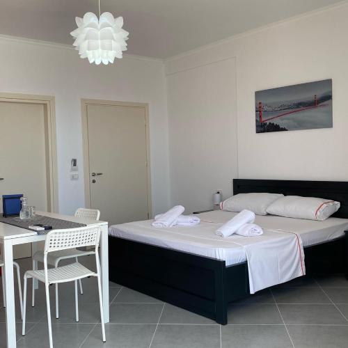 Ένα ή περισσότερα κρεβάτια σε δωμάτιο στο TERRACE VIEW APARTMENTS