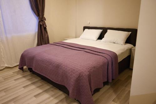 Postel nebo postele na pokoji v ubytování Hotel Leda