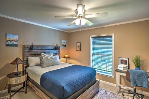 a bedroom with a bed and a ceiling fan at Catskills Home with Yard and Media Room, Near Hiking in East Durham