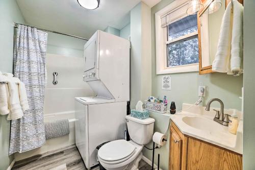 a small bathroom with a toilet and a sink at Dog-Friendly Harrison Retreat with Grill and Fire Pit! in Harrison