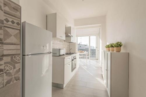 Una cocina o kitchenette en Rosa House