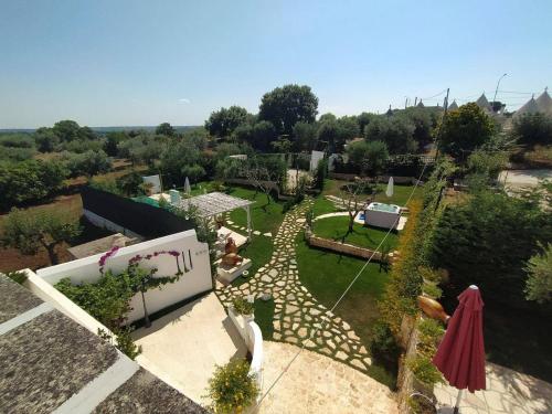 an aerial view of a backyard with a garden at Dimora San Quirico - bed e breakfast - Cisternino in Cisternino