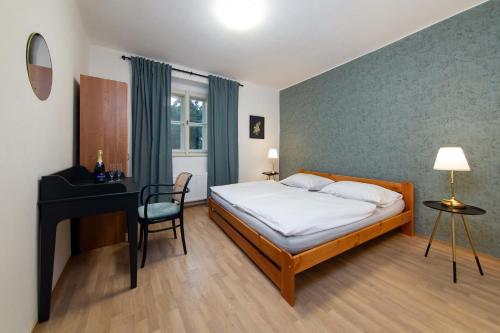 Cama o camas de una habitación en Zámek Nečtiny