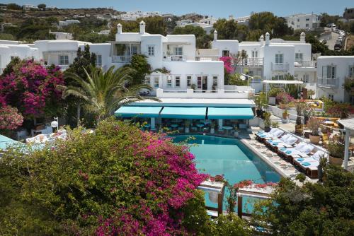 an aerial view of a hotel with a pool and buildings at Belvedere Mykonos - Main Hotel in Mýkonos City