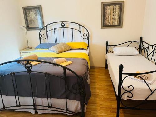 Postel nebo postele na pokoji v ubytování Villa Carmen