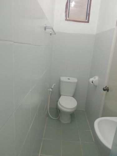 Ванная комната в Bucana beachfront guesthouse