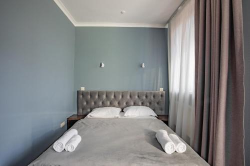Cama o camas de una habitación en Wellland Hotel