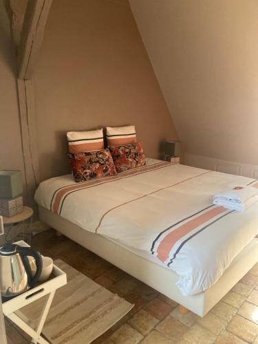 Ένα ή περισσότερα κρεβάτια σε δωμάτιο στο Chambre Capucine