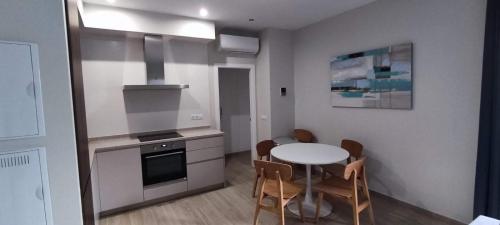 A kitchen or kitchenette at Guesting Hospital