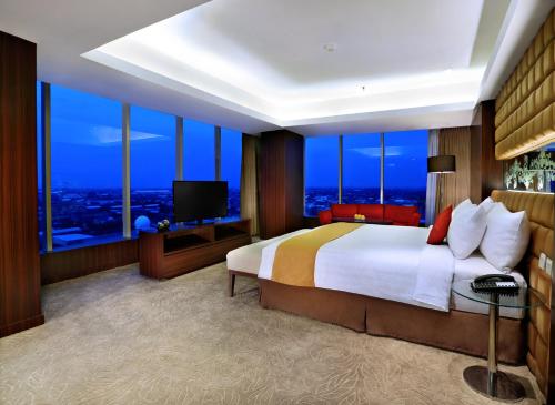 Μια τηλεόραση ή/και κέντρο ψυχαγωγίας στο Aston Madiun Hotel & Conference Center