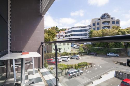a balcony with a view of a parking lot at 315 Euro Motel and Serviced Apartments in Dunedin