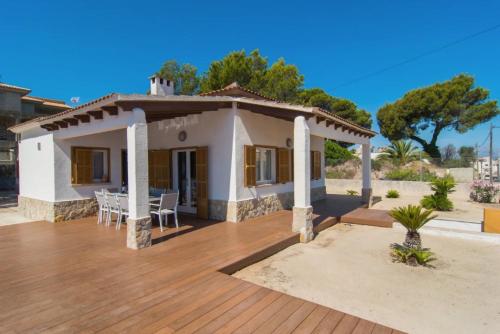 a villa with a view of a house at Anglesos in Can Picafort