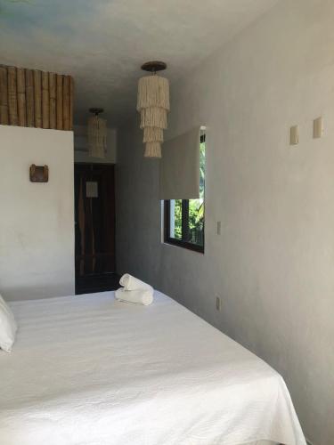 Katil atau katil-katil dalam bilik di Xcabal Hotel boutique