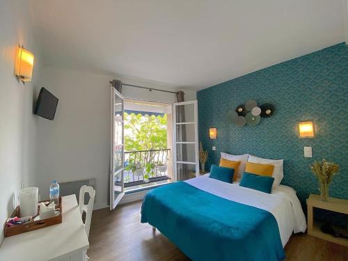 Postel nebo postele na pokoji v ubytování Hôtel Le Vauban