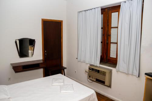 Postel nebo postele na pokoji v ubytování Amazonas Palace Hotel Belo Horizonte - Avenida Amazonas