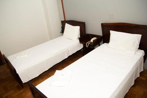 Postel nebo postele na pokoji v ubytování Amazonas Palace Hotel Belo Horizonte - Avenida Amazonas