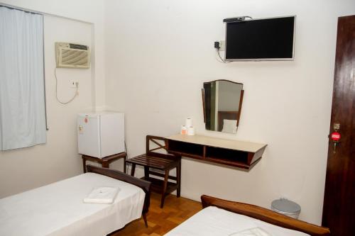 Postel nebo postele na pokoji v ubytování Amazonas Palace Hotel Belo Horizonte - Avenida Amazonas