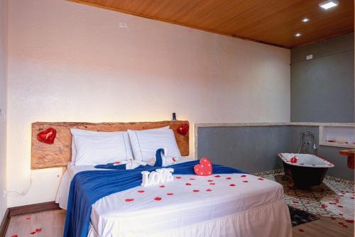 Ein Bett oder Betten in einem Zimmer der Unterkunft Casa em Campos do Jordão