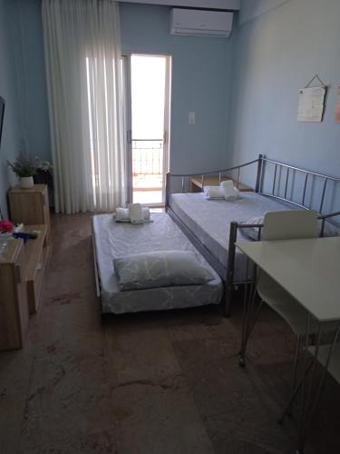 Letto o letti in una camera di Marina's Apartments - Ciel Apartment