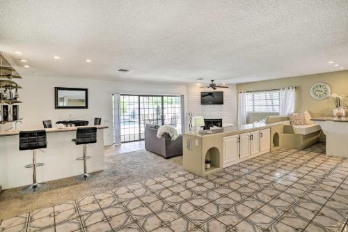 a large living room with a couch and a table at Bright Indio Home with Pool about 2 Mi to Coachella in Indio