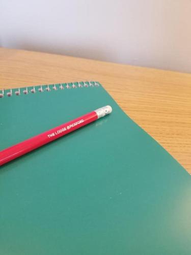 a ruler and a pencil sitting on a table at The Lodge at Pickford House NEC and B'Ham Airport, Coventry in Coventry