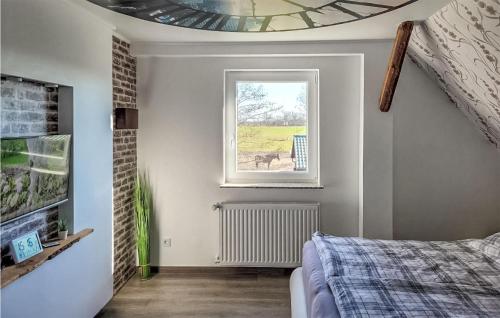 Ένα ή περισσότερα κρεβάτια σε δωμάτιο στο Nice Apartment In Wurster Nordseeküste
