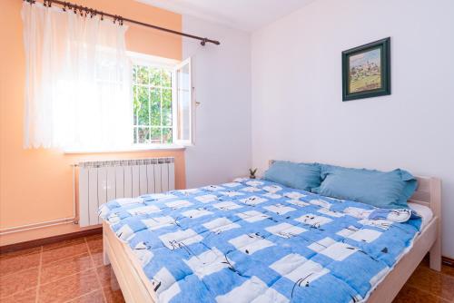 מיטה או מיטות בחדר ב-Apartments with a swimming pool Opatija - Pobri, Opatija - 16390