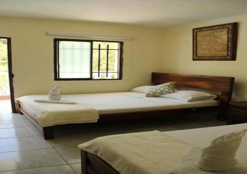 Katil atau katil-katil dalam bilik di Natural Sea