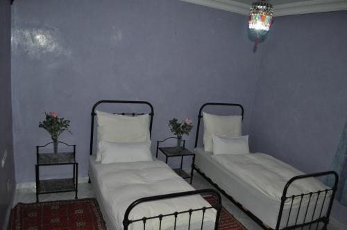 Cama o camas de una habitación en Zina