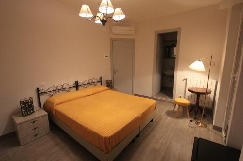 Posteľ alebo postele v izbe v ubytovaní Hotel B&B Francesca