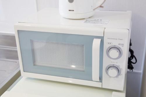 プロスパービル 4Aにあるキッチンまたは簡易キッチン