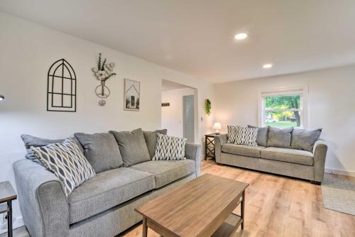 a living room with a couch and a table at Centrally Located Mount Pleasant Retreat! in Mount Pleasant