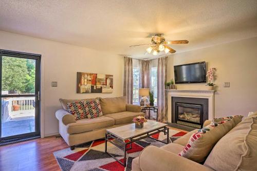 a living room with a couch and a fireplace at 9 Mi to Richmond Sandston Home with Office in Sandston