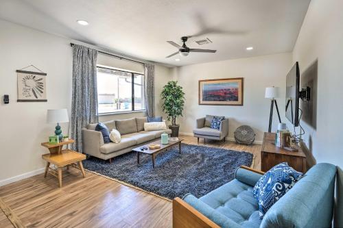 a living room with a couch and a table at Pool and Backyard Oasis! Snowbird Escape in Phoenix in Phoenix