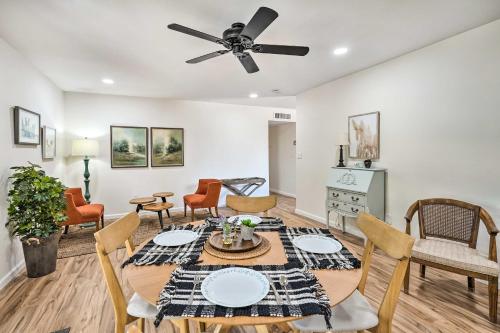 a dining room and living room with a table and chairs at Pool and Backyard Oasis! Snowbird Escape in Phoenix in Phoenix