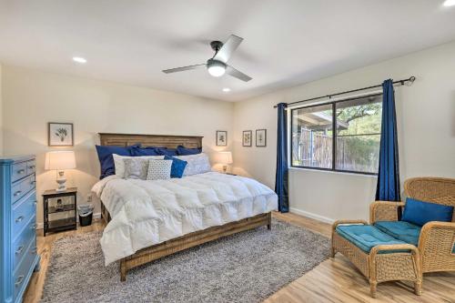 a bedroom with a bed and a window at Sunny Phoenix Home with Pool and Backyard Oasis! in Phoenix