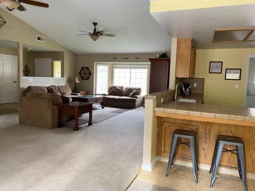 a large living room with a couch and a table at Waxberry Getaway Sequoia/Kings Canyon National Pks in Squaw Valley